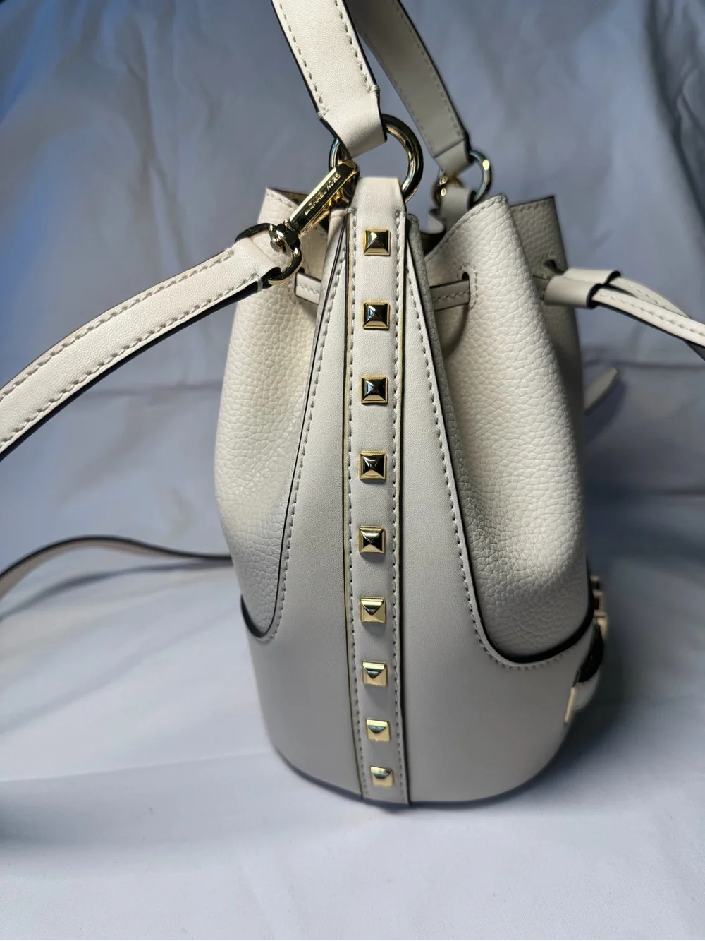 Michael Kors Cream Leather Mini Drawstring Bucket Bag with Gold MK Hardware